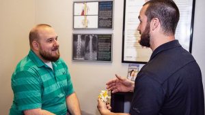 Consultation at Reach Chiropractic in Kennesaw